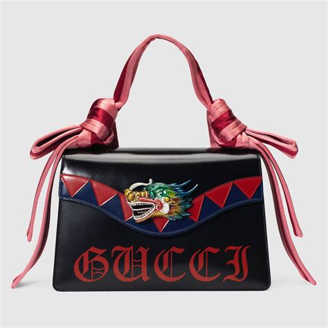 gucci bag dragon|Gucci dynasos bag mini.